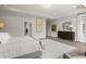Large main bedroom features a luxurious bed, dresser, and decor at 753 Brooke View Drive, Canton, GA 30115