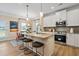 Modern kitchen with a granite island, stainless steel appliances, and stylish pendant lighting at 22 Jacobs Farm Ln # 11, Lawrenceville, GA 30045