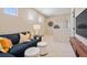 Modern living room with plush blue sofa, cozy seating, and stylish decor for comfortable relaxation at 22 Jacobs Farm Ln # 11, Lawrenceville, GA 30045