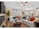 Inviting living room with a fireplace, natural light, and hardwood floors at 22 Jacobs Farm Ln # 11, Lawrenceville, GA 30045