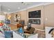 Cozy living room with a fireplace, large TV, and stylish decor at 22 Jacobs Farm Ln # 11, Lawrenceville, GA 30045