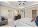 Relaxing bedroom boasts a tray ceiling, and ensuite bathroom with stylish finishes and ample space at 22 Jacobs Farm Ln # 11, Lawrenceville, GA 30045