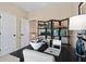 Bright office features a functional layout with shelving for storage, and a comfortable workspace at 22 Jacobs Farm Ln # 11, Lawrenceville, GA 30045