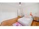 Bright bedroom with hardwood floors and stylish furnishings at 3222 Edgemont Way, Decatur, GA 30032