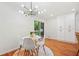 Inviting dining area features natural light from sliding glass door and built in cabinets at 3222 Edgemont Way, Decatur, GA 30032
