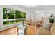 Cozy living room featuring hardwood floors, large windows with outdoor views, and stylish furnishings at 3222 Edgemont Way, Decatur, GA 30032