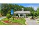 A beautifully landscaped entryway to the Soleli community resort level 55+ living clubhouse at 327 Brooke View Trail, Canton, GA 30115