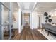 Inviting entryway with wood floors, decorative columns, and an open floor plan at 327 Brooke View Trail, Canton, GA 30115