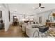 Spacious living area with fireplace and an open floor plan connecting to the dining and kitchen areas at 327 Brooke View Trail, Canton, GA 30115