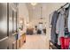 Welcoming entryway featuring light wood floors, a high ceiling, and a view of the living space at 3619 Elinburg Ne Ct, Buford, GA 30519