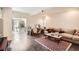 Comfortable living room with stylish accents, a large sofa, and a decorative rug creating a relaxing atmosphere at 3619 Elinburg Ne Ct, Buford, GA 30519