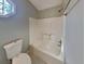 Clean, bright bathroom with a shower-tub combo and classic fixtures, perfect for a comfortable experience at 4465 Kent Rd, Atlanta, GA 30337