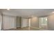 Main bedroom featuring fresh paint, new flooring, two large closets and private access to the main bathroom at 4465 Kent Rd, Atlanta, GA 30337