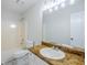 Bathroom with a vanity, commode, and a shower-tub combination at 49 Sweetwater Ct, Powder Springs, GA 30127