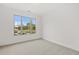 Carpeted bedroom with window and view outside at 778 Brooke View Drive, Canton, GA 30115