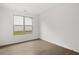 Bright bedroom with large window and hardwood floors at 778 Brooke View Drive, Canton, GA 30115