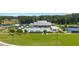 Beautiful community pool and recreation center featuring a pool, tennis courts, and manicured lawn at 778 Brooke View Drive, Canton, GA 30115