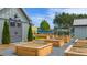 Charming garden shed with raised garden beds and gravel pathways for gardening enthusiasts at 778 Brooke View Drive, Canton, GA 30115