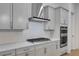 Close-up of kitchen with stainless steel appliances, quartz countertops, and white subway tile backsplash at 778 Brooke View Drive, Canton, GA 30115