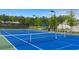 Well-maintained tennis courts offer a great space for recreation and fitness in a picturesque setting at 778 Brooke View Drive, Canton, GA 30115
