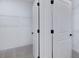 Spacious walk-in closet featuring multiple doors and shelving at 778 Brooke View Drive, Canton, GA 30115