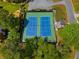 Birds eye view of neighborhood tennis courts with fence at 2830 Scottish Mill Way, Marietta, GA 30068