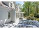 Spacious back deck featuring white trim and a screened-in porch, ideal for outdoor entertaining at 2830 Scottish Mill Way, Marietta, GA 30068