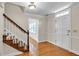 Inviting foyer with hardwood floors, classic staircase, and elegant trim at 2830 Scottish Mill Way, Marietta, GA 30068