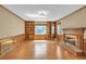 Spacious living room features a brick fireplace, built-in bookshelves, and hardwood floors at 2830 Scottish Mill Way, Marietta, GA 30068