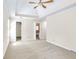 Large main bedroom features a vaulted ceiling, carpet flooring, and access to ensuite bathroom at 2830 Scottish Mill Way, Marietta, GA 30068