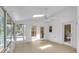 Enclosed sun room with tile floors and multiple windows allowing natural light at 2830 Scottish Mill Way, Marietta, GA 30068