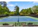 Community tennis courts with a dark green fence at 2830 Scottish Mill Way, Marietta, GA 30068