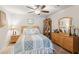 Nicely decorated bedroom featuring coordinated furniture and natural light at 4365 Sunflower Cir, Cumming, GA 30040