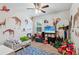 bedroom with animal decals and a ceiling fan providing comfort and style at 4365 Sunflower Cir, Cumming, GA 30040