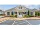 Community clubhouse with well-maintained landscaping offering a welcoming space for gatherings and events at 4365 Sunflower Cir, Cumming, GA 30040