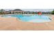 Resort-style community pool with a zero entry, ample seating, and a nearby playground, perfect for Gathering fun at 4365 Sunflower Cir, Cumming, GA 30040