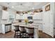 Charming kitchen with white cabinets, granite countertops, stainless steel appliances, and a center island at 4365 Sunflower Cir, Cumming, GA 30040