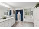 Bright bathroom with granite vanity, and shower/tub providing options for relaxation at 4365 Sunflower Cir, Cumming, GA 30040