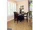 Cozy dining nook features decorative art and a view to the exterior at 978 Francis Ln, Fairburn, GA 30213