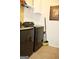 Functional laundry area equipped with modern washer and dryer at 978 Francis Ln, Fairburn, GA 30213