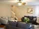 Comfortable living room featuring neutral tones and plenty of seating options at 978 Francis Ln, Fairburn, GA 30213