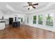 Open-concept kitchen featuring an island and ample natural light with an adjacent seating area at 1612 Branch Creek Cv, Lawrenceville, GA 30043