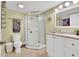 This bathroom features a glass shower, white vanity, and neutral decor at 3411 Morgan Rd, Canton, GA 30115