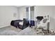 Bedroom with a bed, desk, chair, and carpeting at 3411 Morgan Rd, Canton, GA 30115