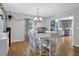 Charming dining area filled with natural light, connecting seamlessly to the adjacent kitchen and living spaces at 3411 Morgan Rd, Canton, GA 30115
