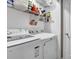 Well-equipped laundry room with modern appliances and ample storage space at 3411 Morgan Rd, Canton, GA 30115
