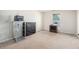 Bedroom with carpet flooring, a window, and closet space at 7835 Teton Trl, Douglasville, GA 30134