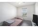 Bedroom with carpet flooring and a sunlit window at 7835 Teton Trl, Douglasville, GA 30134