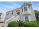 Charming home featuring white siding, a bay window, and a well-manicured front yard at 7835 Teton Trl, Douglasville, GA 30134