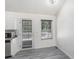 Kitchen with view of grey floors and stainless steel appliances at 7835 Teton Trl, Douglasville, GA 30134